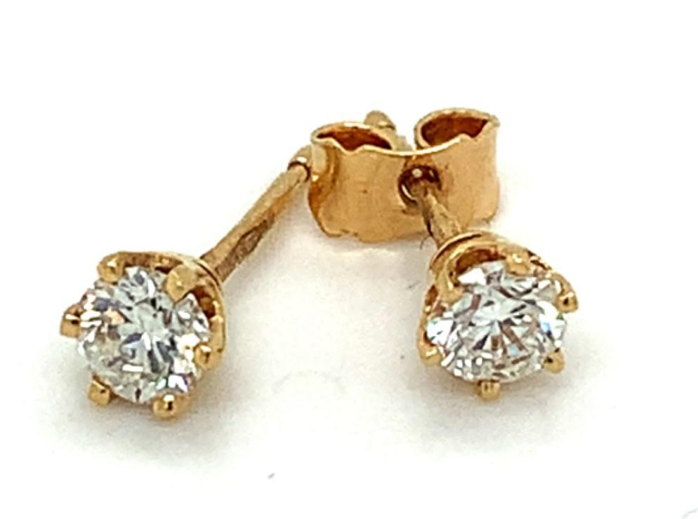 0.60ct diamond stud earrings set in 18kt yellow gold, H/I colour, SI clarity