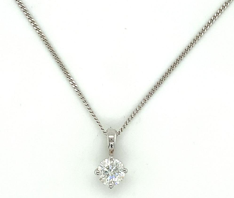 0.60ct round brilliant diamond solitaire pendant, 18kt white gold, G/H colour, SI clarity