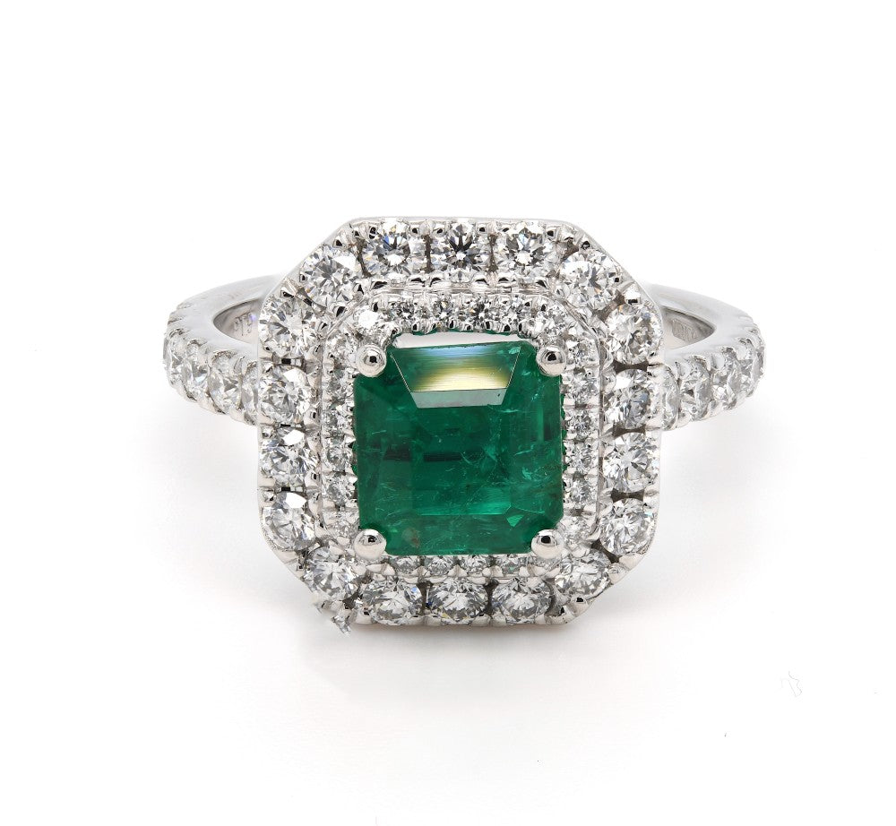 2.33ct emerald & diamond ring set in a platinum double halo