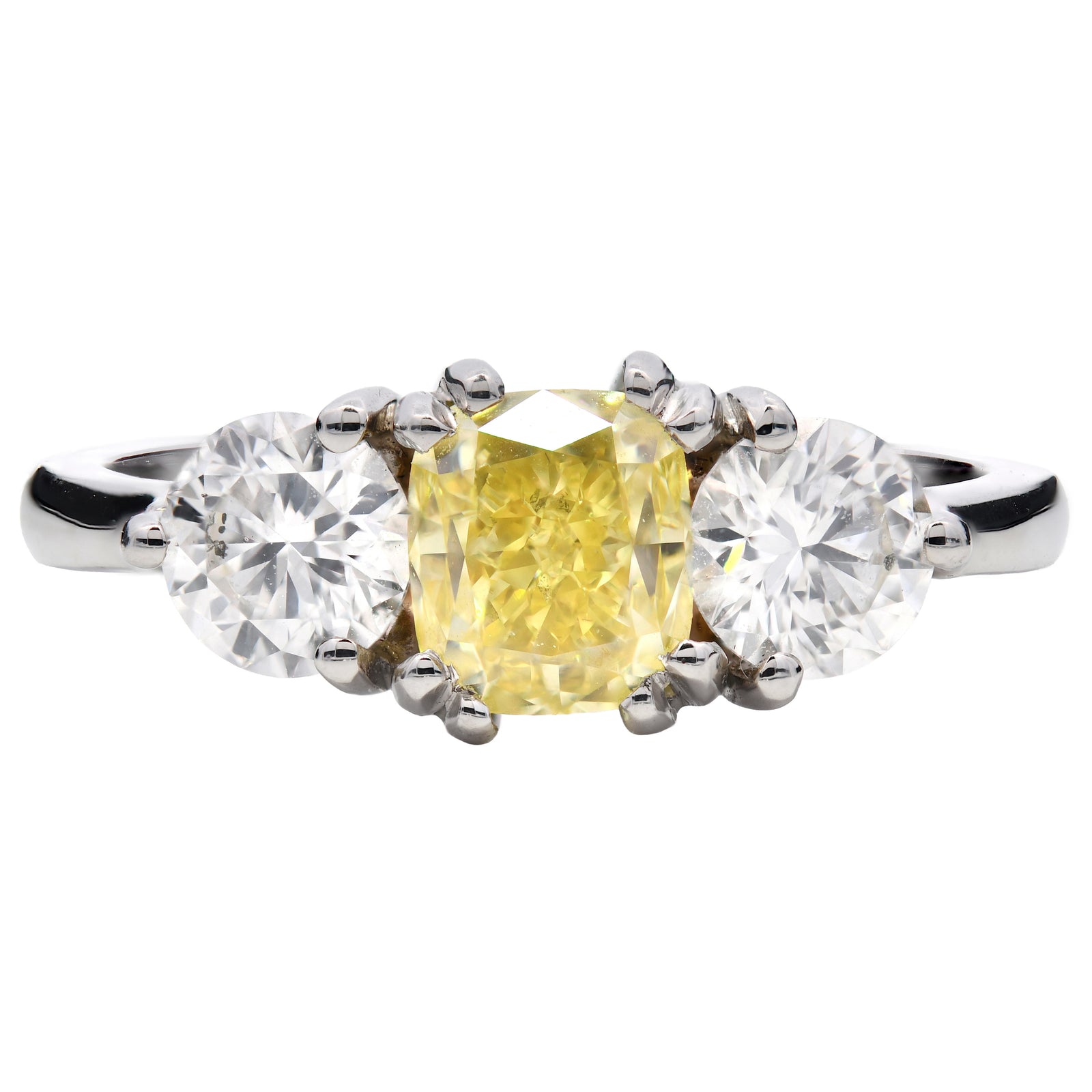 1.81ct natural diamond trilogy engagement ring, cushion cut, fancy intense yellow, SI1 clarity, GIA certified. Platinum