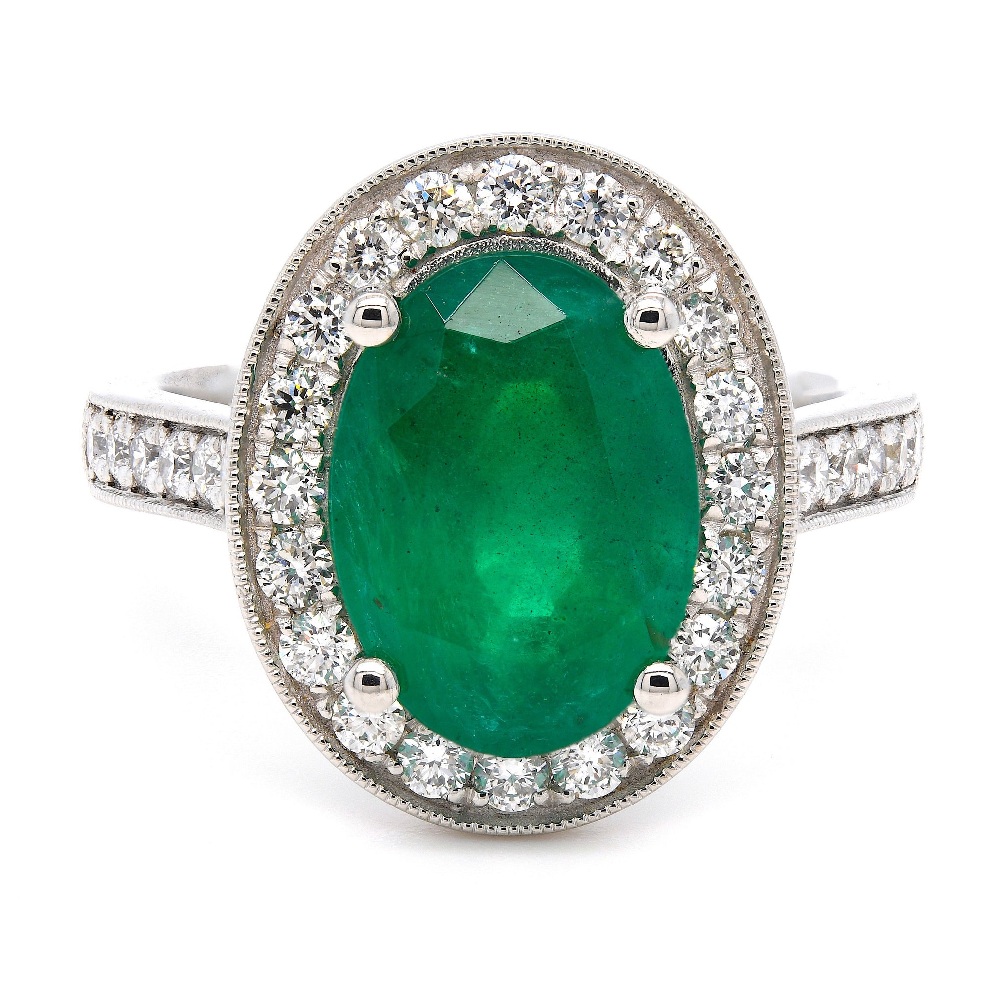 4.58ct emerald & diamond ring set in a platinum halo