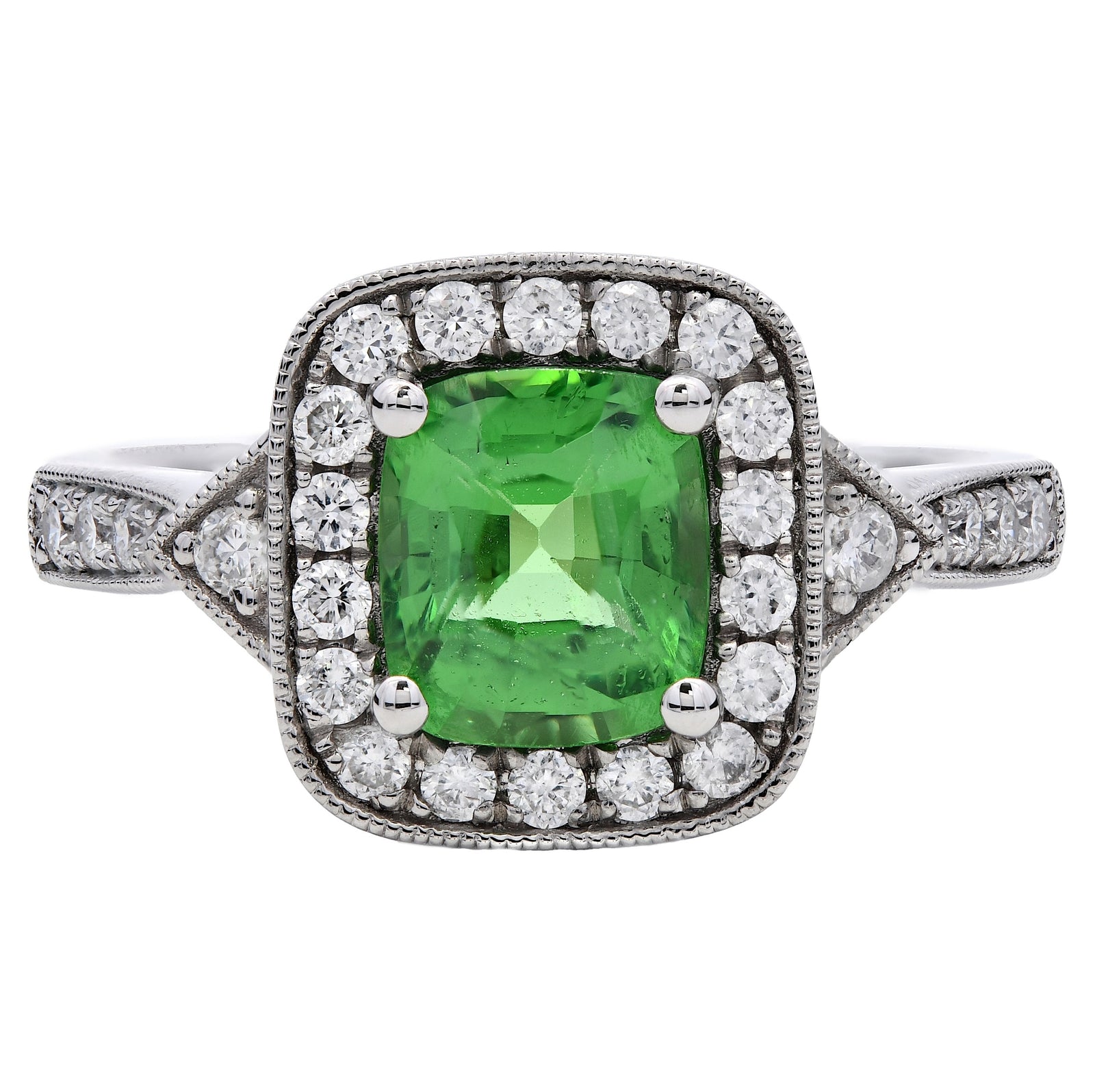 1.65ct cushion cut tsavorite & diamond engagement ring set in a platinum halo