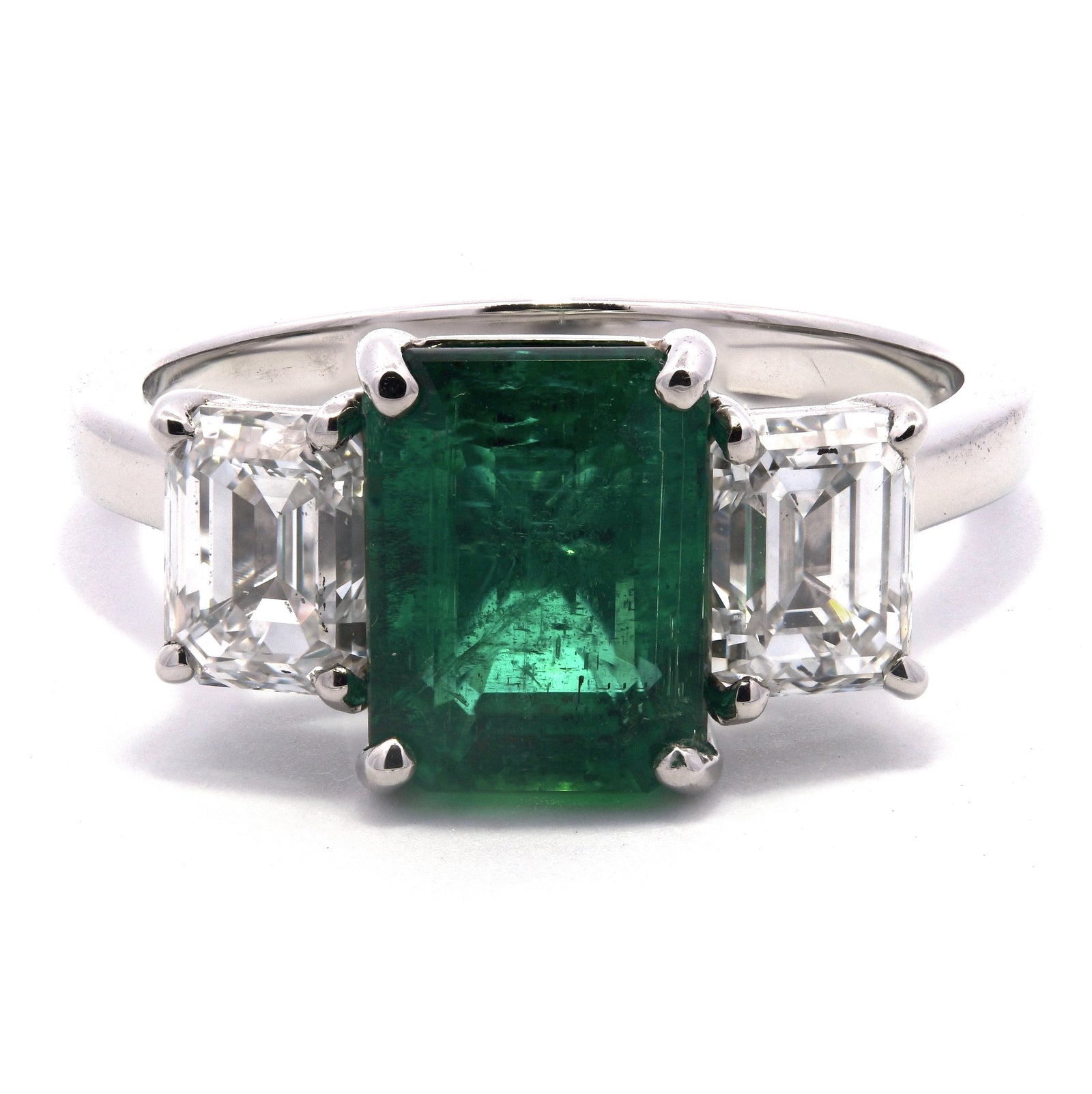 3.58ct emerald & diamond trilogy ring, G colour, VS2 clarity, platinum. GIA & WGI certified