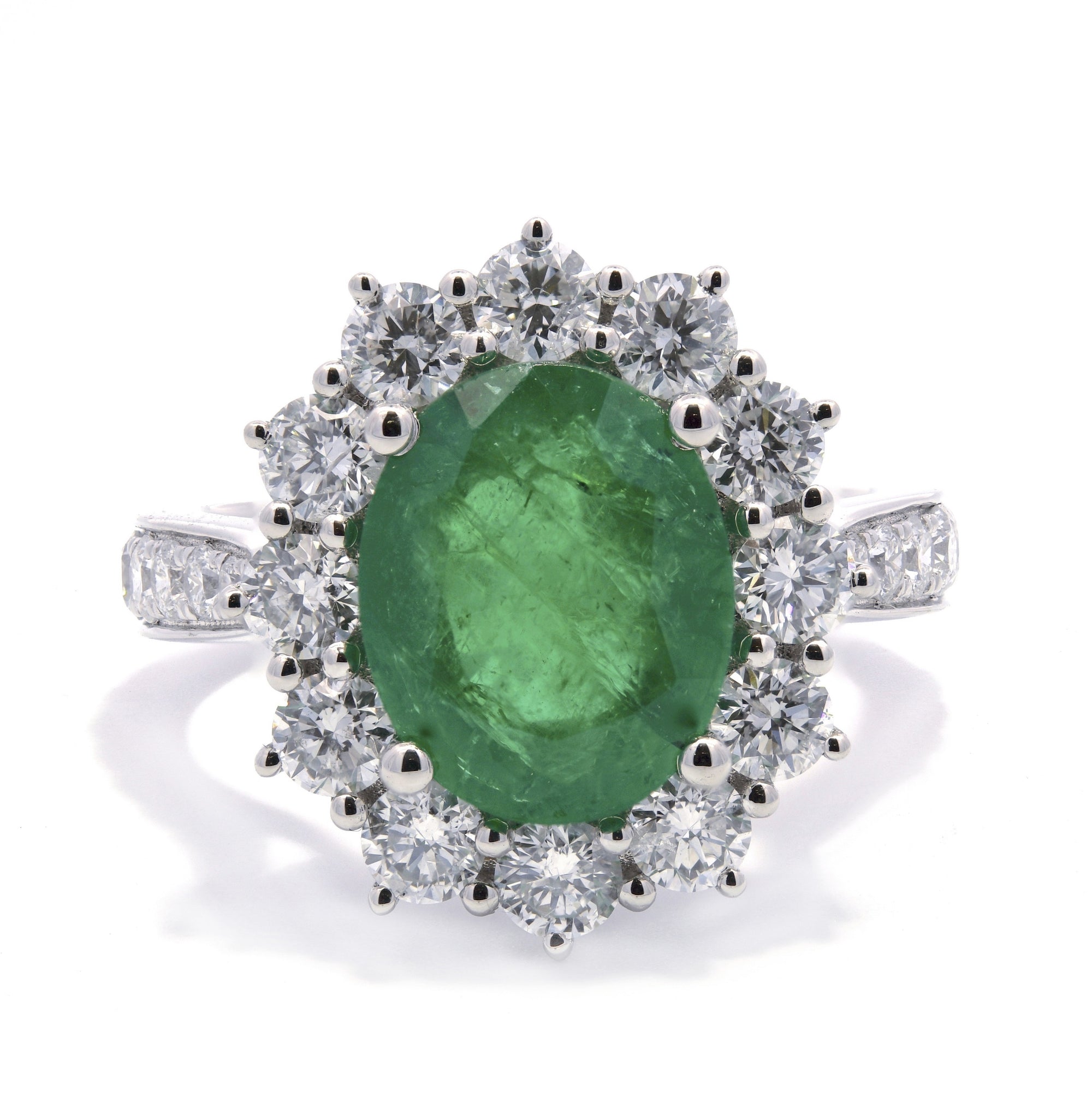 4.53ct emerald & diamond engagement ring set in a platinum halo