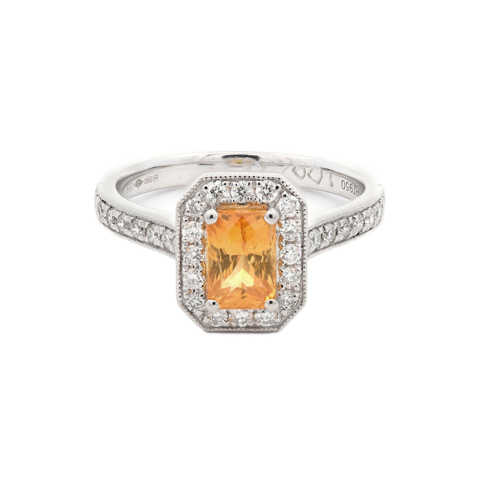 1.44ct yellow sapphire & diamond ring set in a platinum halo
