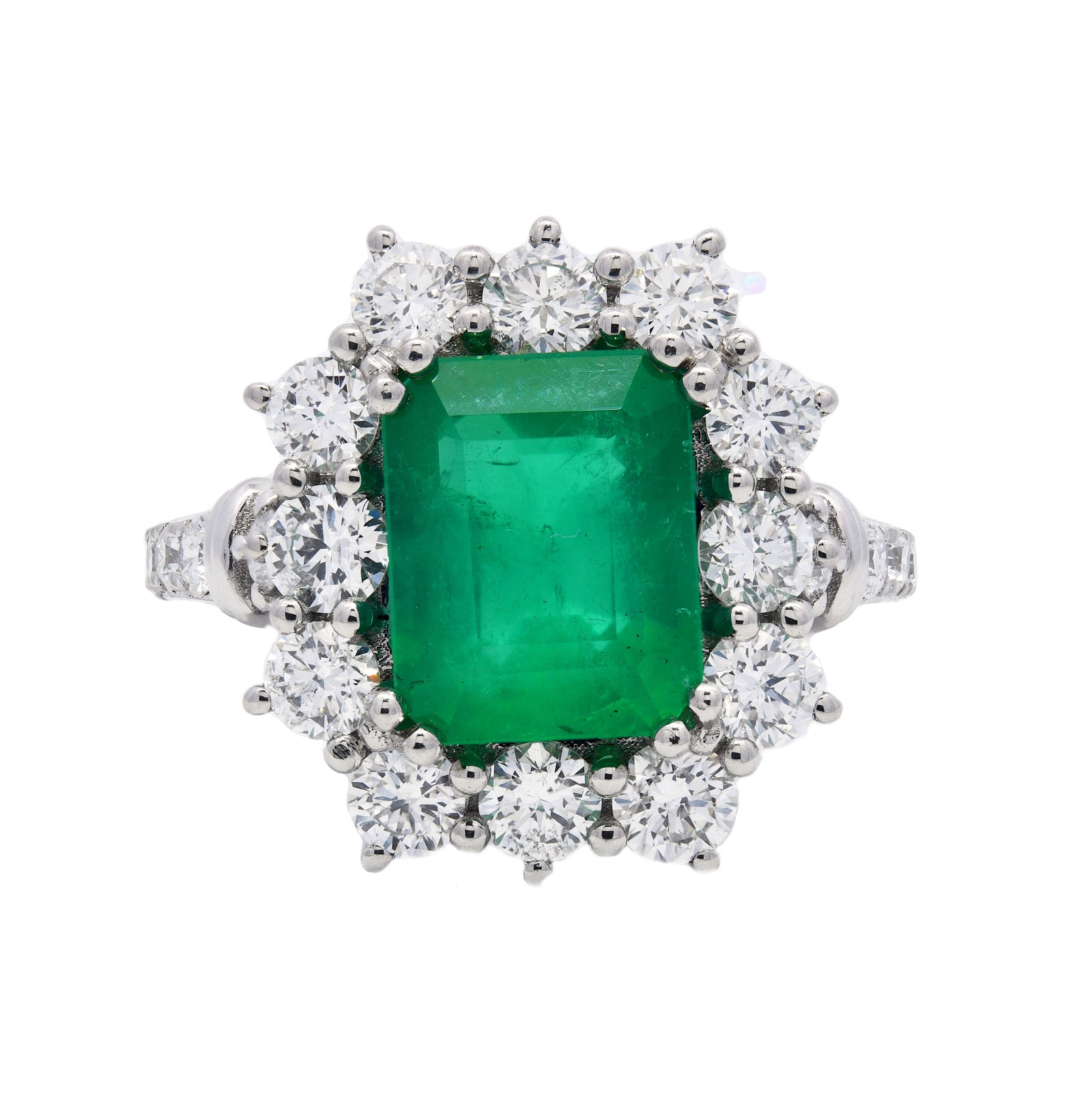 4.01ct emerald & diamond engagement ring set in a platinum halo