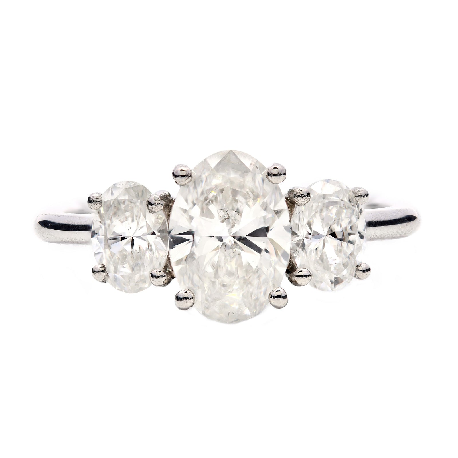 SOLD - 1.52ct natural diamond trilogy engagement ring, oval cut, G colour, SI1 clarity, GIA certified. Platinum