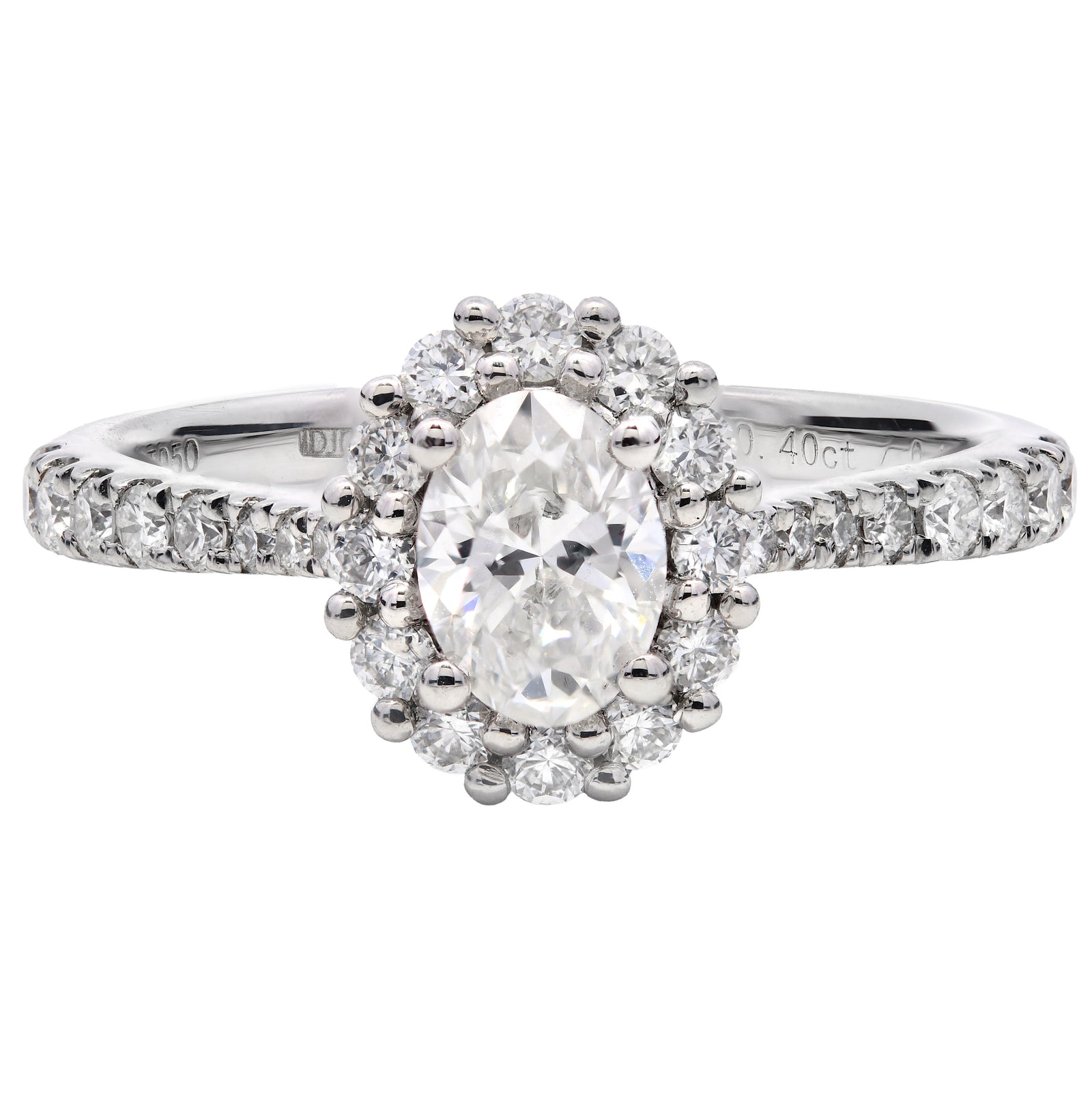 0.80ct natural diamond engagement ring, oval cut, F colour, VS2 clarity, GIA certified. Platinum