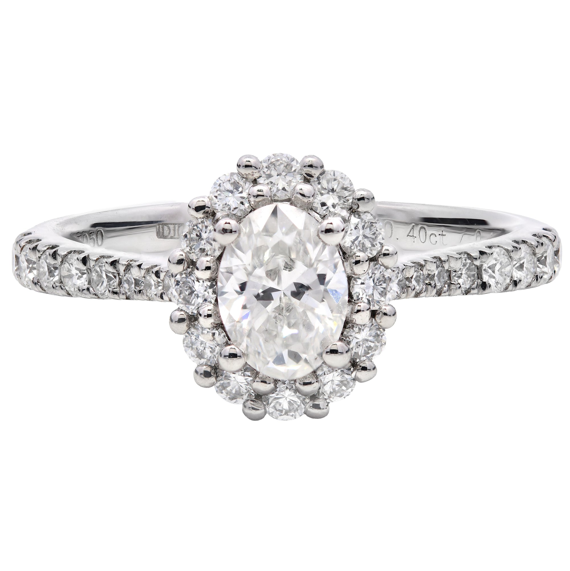 0.80ct oval cut diamond engagement ring, platinum halo, F colour, VS2 clarity, GIA certified