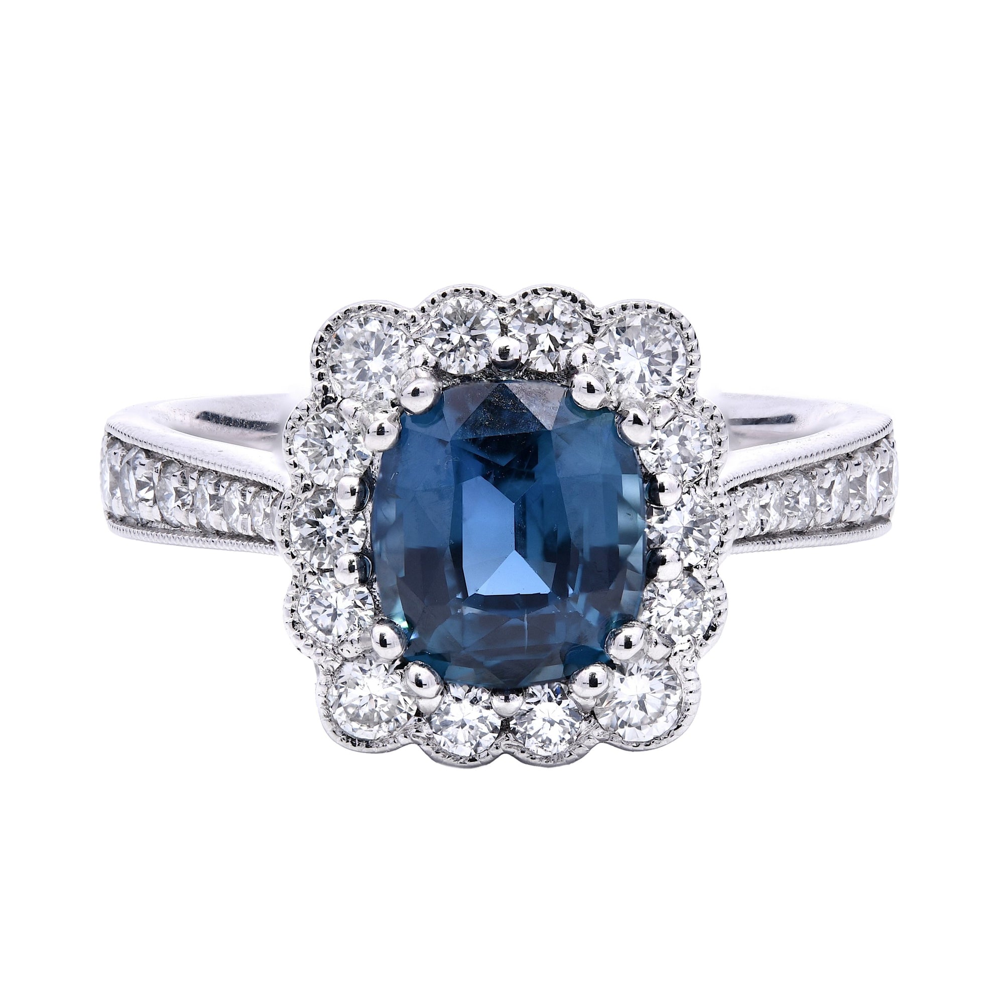 2.70ct teal sapphire & diamond engagement ring set in a platinum halo