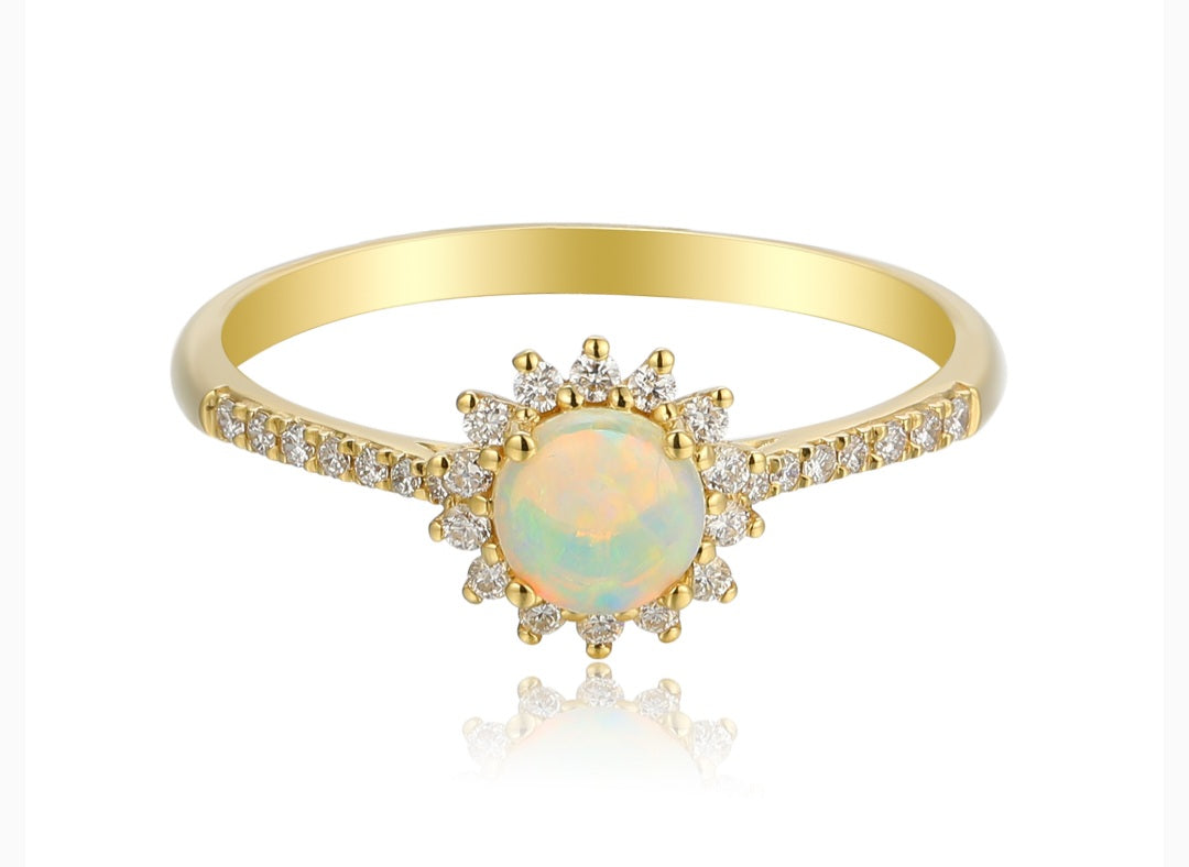 0.44ct opal & diamond ring set in 18ct yellow gold