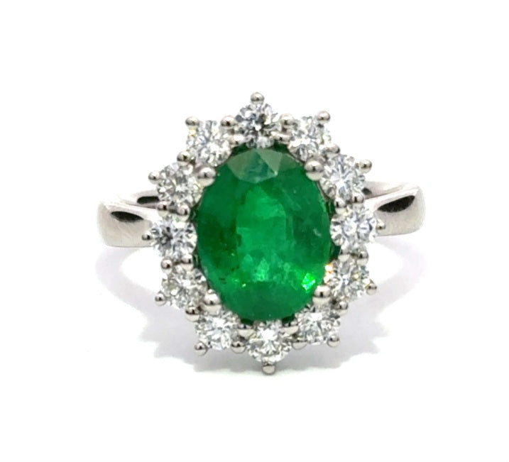 3.46ct emerald & diamond engagement ring set in a platinum cluster