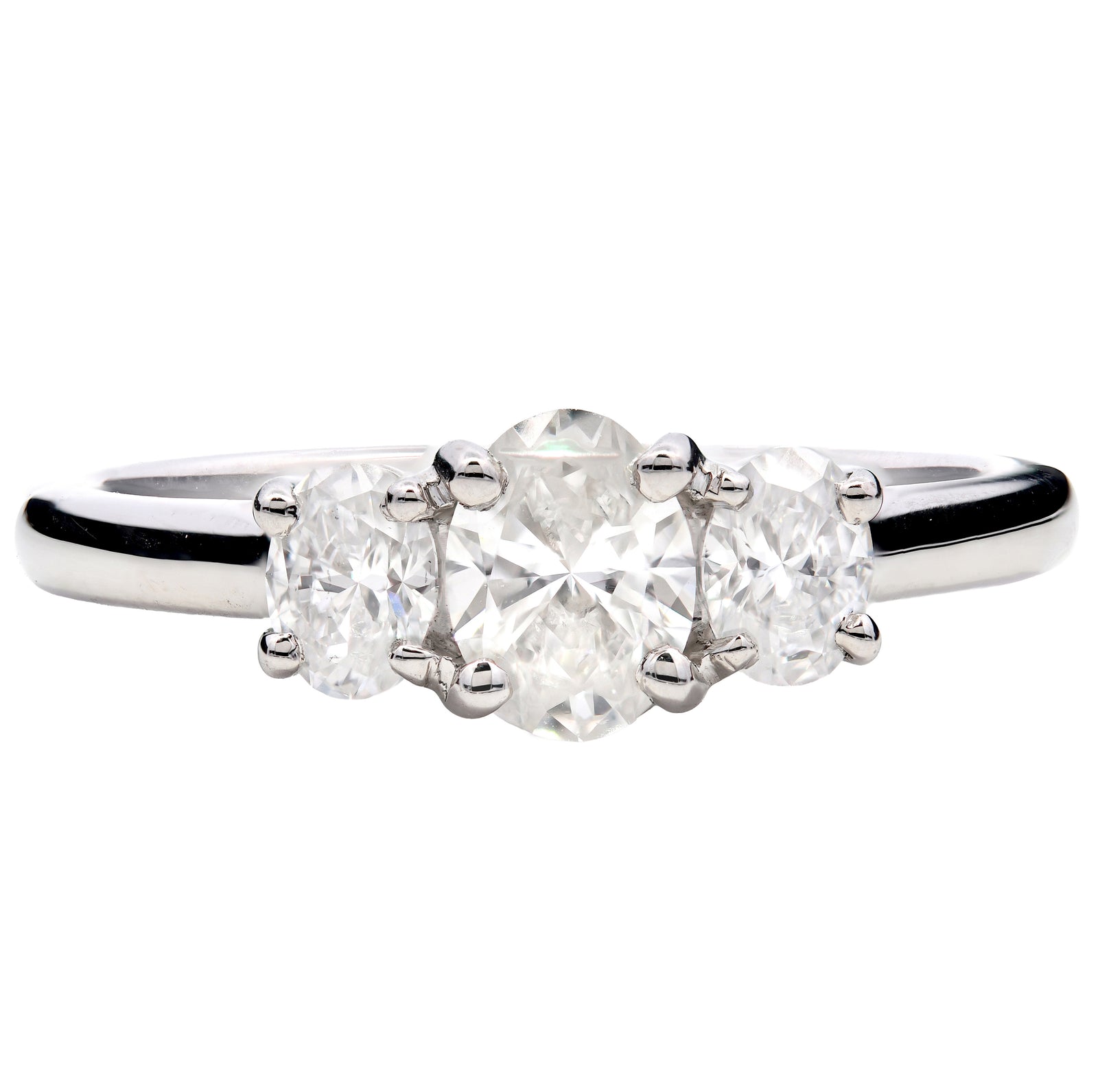 0.72ct natural diamond trilogy engagement ring, G colour, VS2 clarity, GIA certified. Platinum