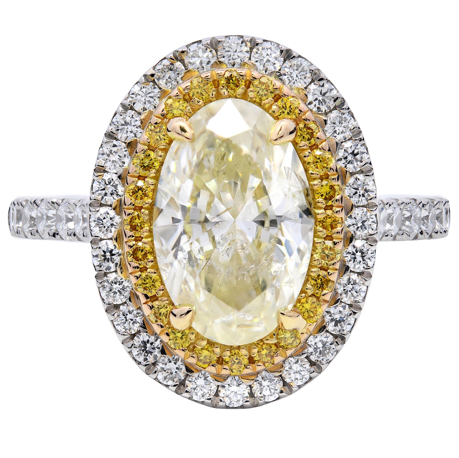 2.18ct natural yellow diamond engagement ring, oval cut, W-X colour, I2 clarity, platinum & 18ct Yellow Gold. WGI certified