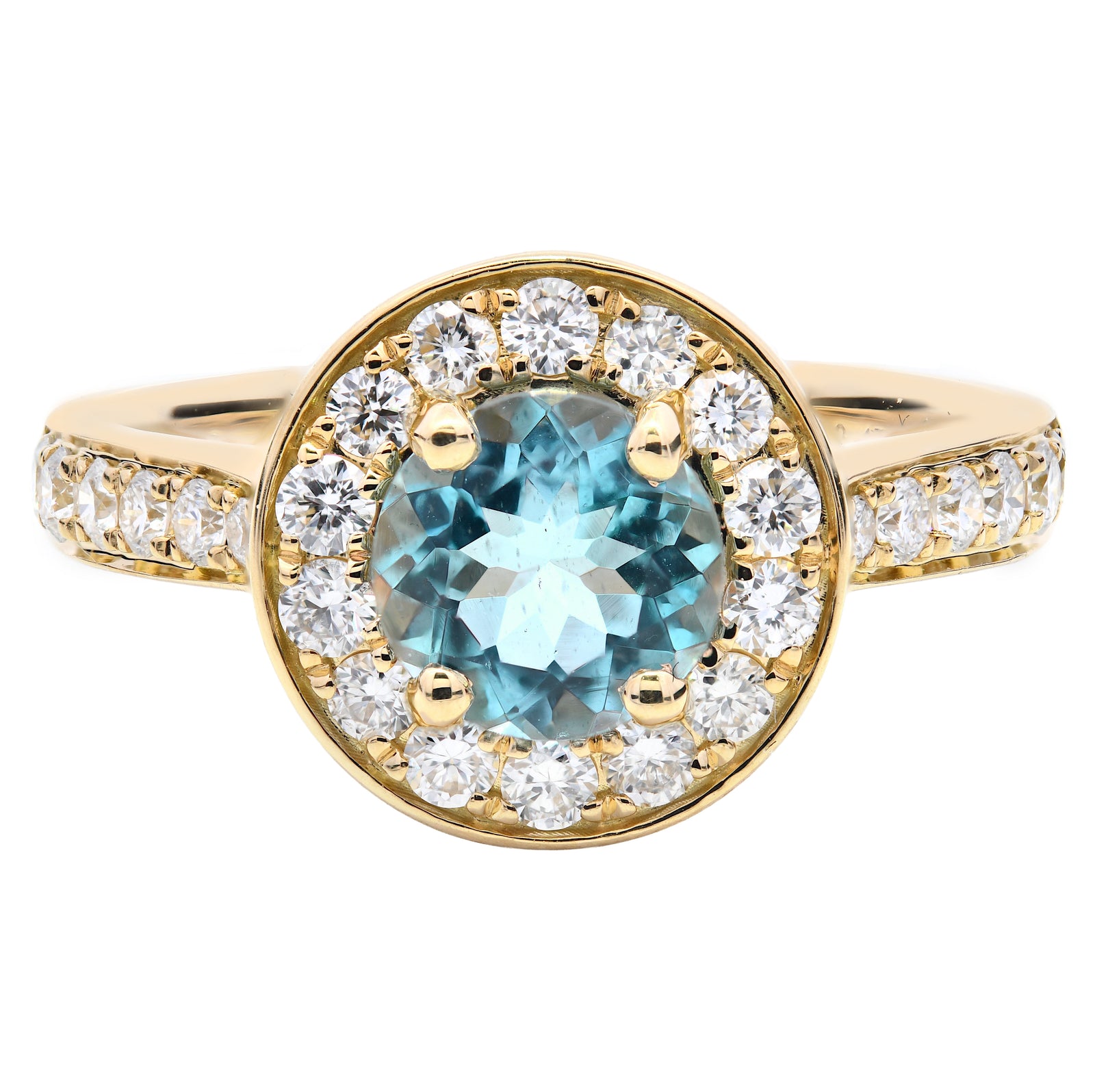 1.11ct aquamarine & natural diamond ring set in an 18ct yellow gold halo. WGI certified
