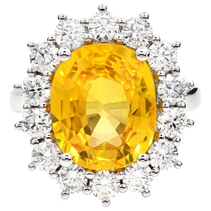 6.90ct yellow sapphire & natural diamond ring set in a platinum halo. WGI certified