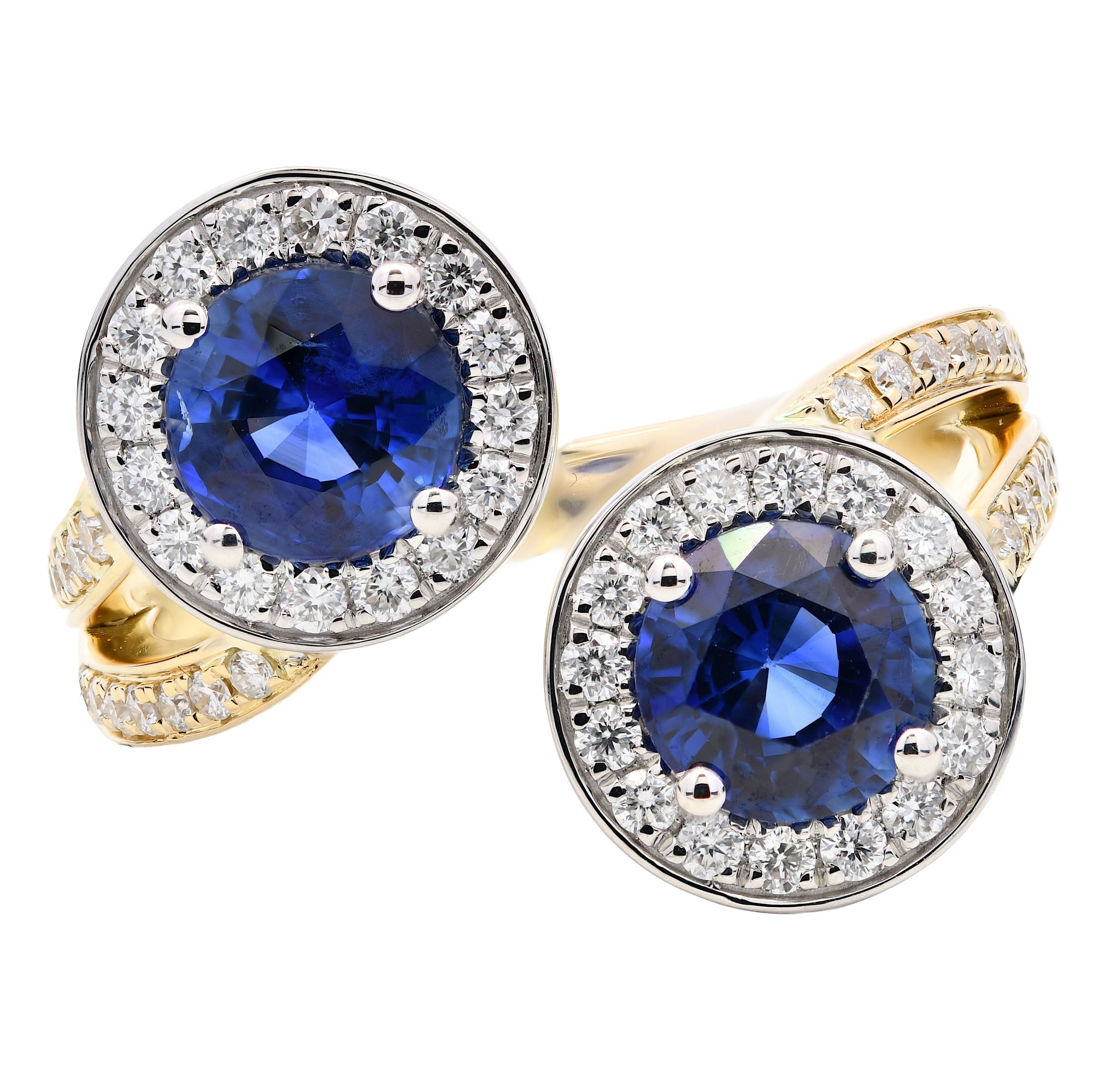 2.62ct blue sapphire & diamond cross over ring set in 18ct yellow gold & platinum. WGI certified