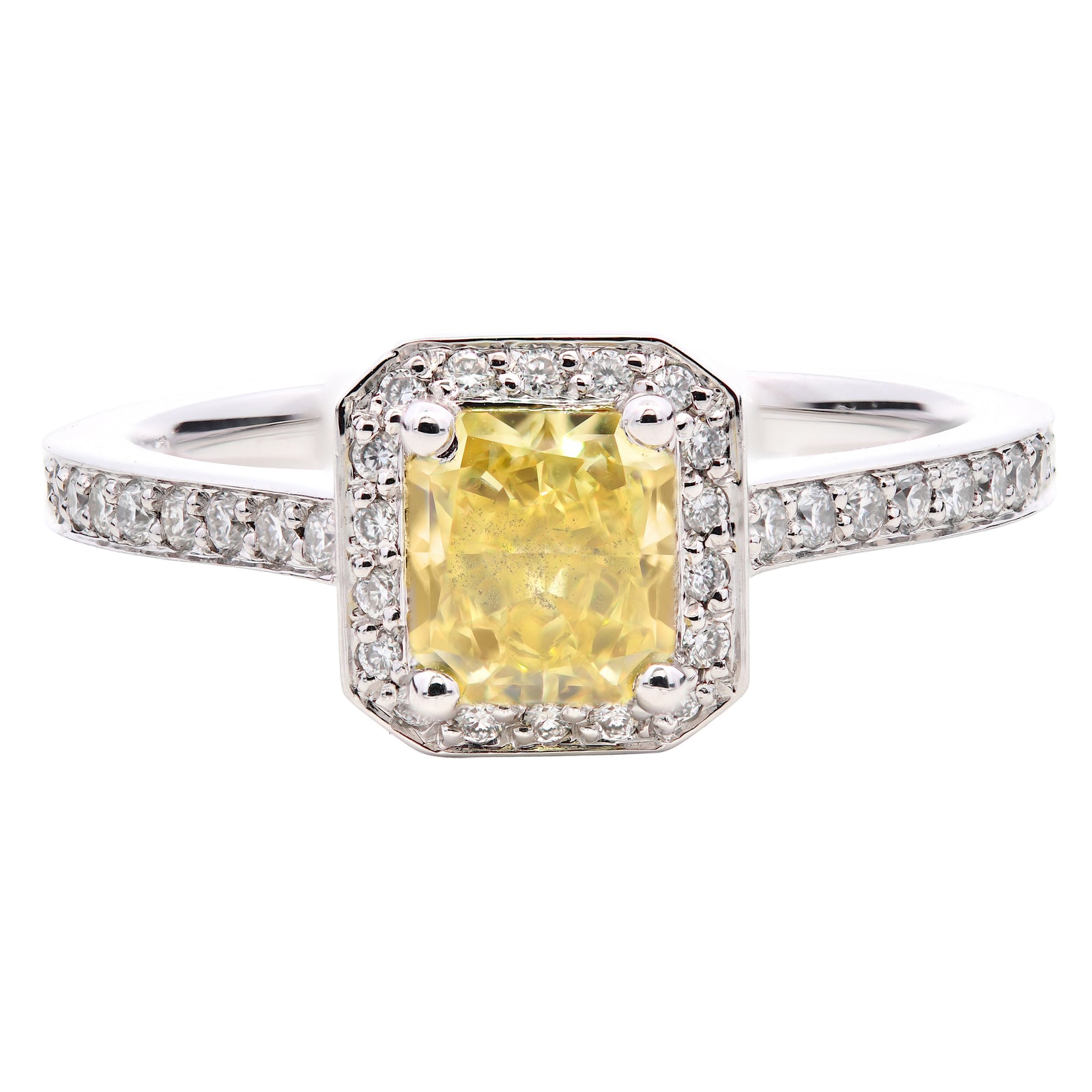 1.01ct natural diamond engagement ring, radiant cut, fancy vivid yellow, VS1 clarity, GIA certified. Platinum
