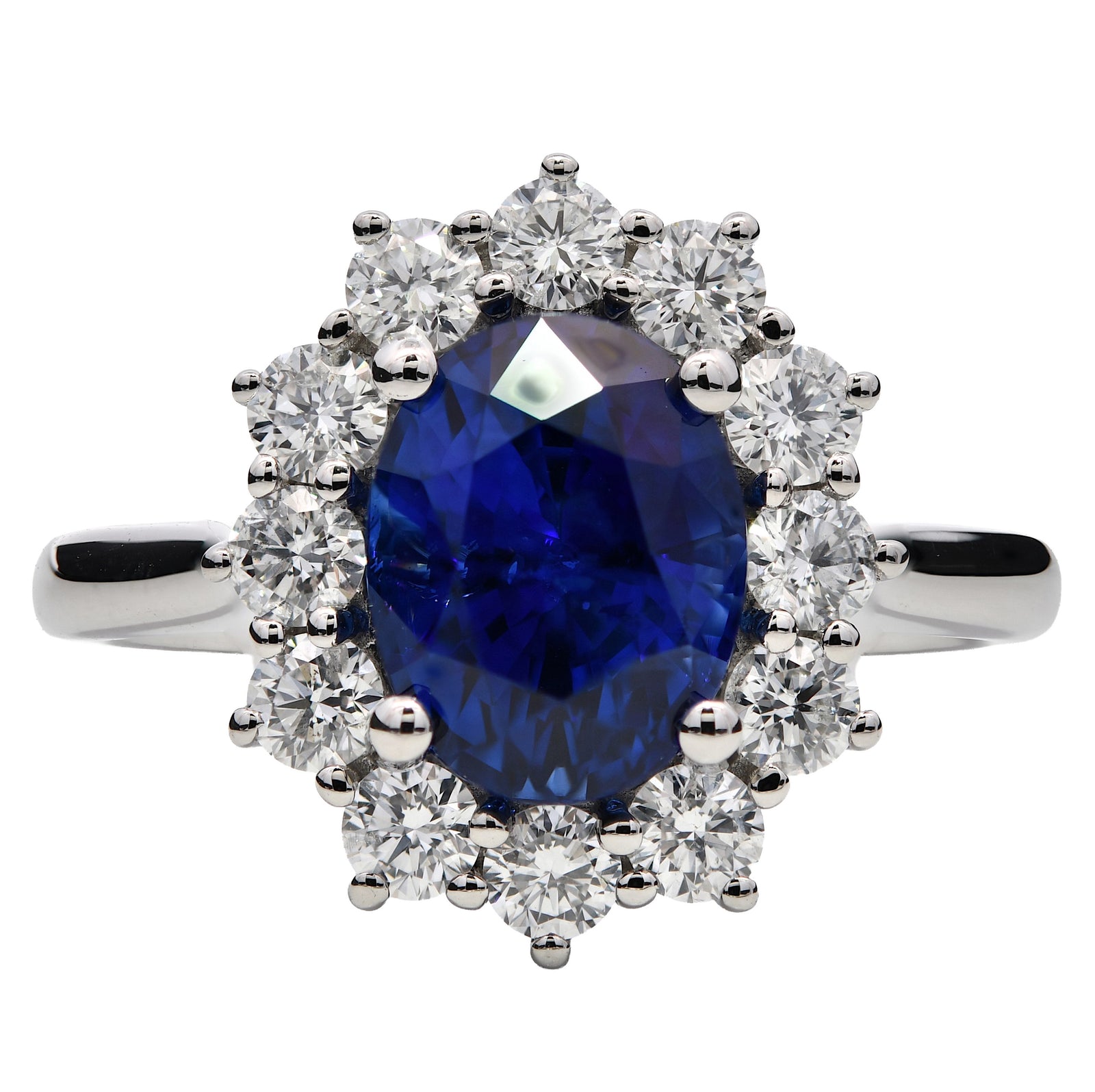 3.37ct blue sapphire & diamond engagement ring set in platinum. WGI certified