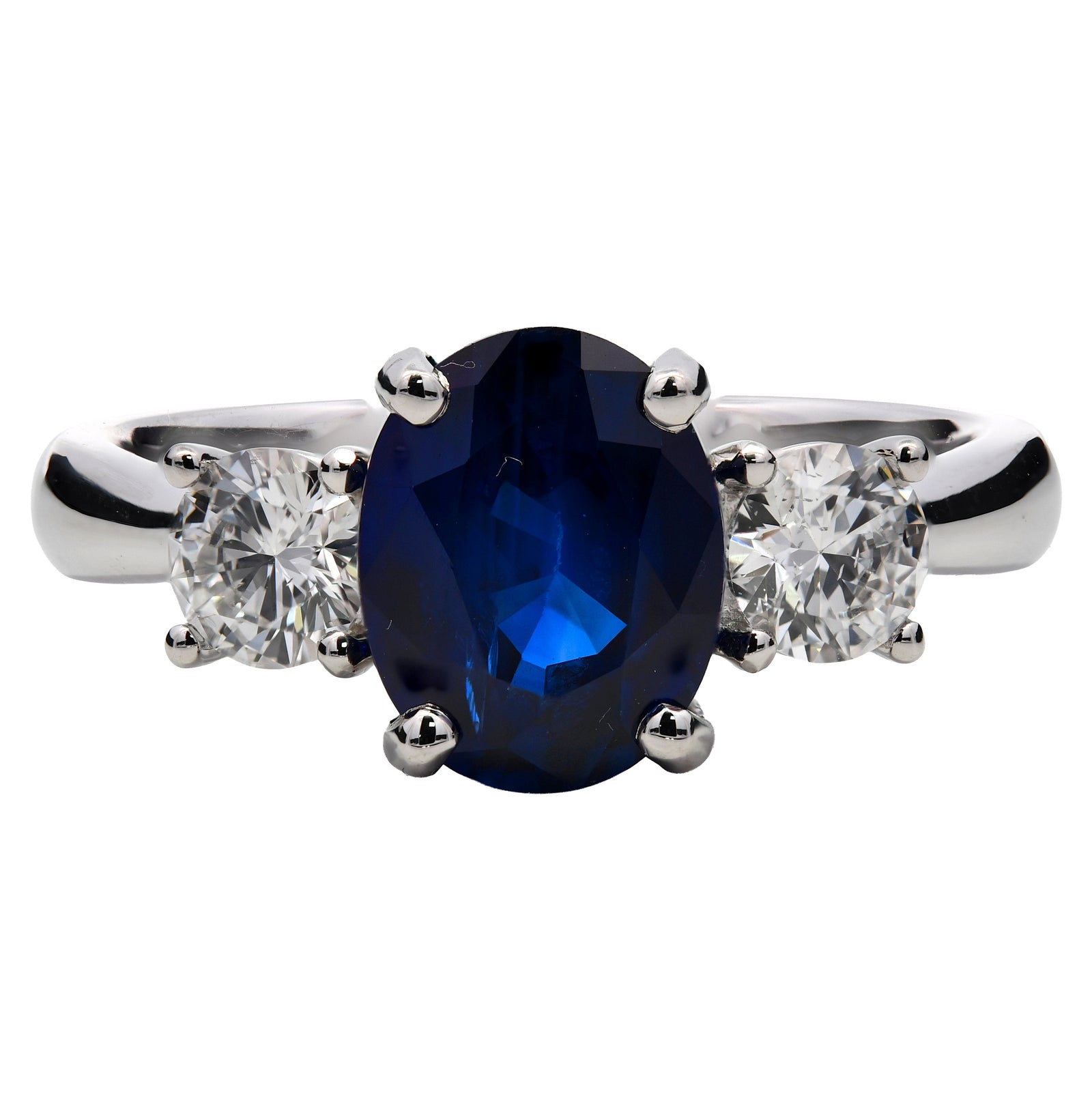 2.48ct blue sapphire & diamond engagement ring, oval cut set in platinum. WGI certified