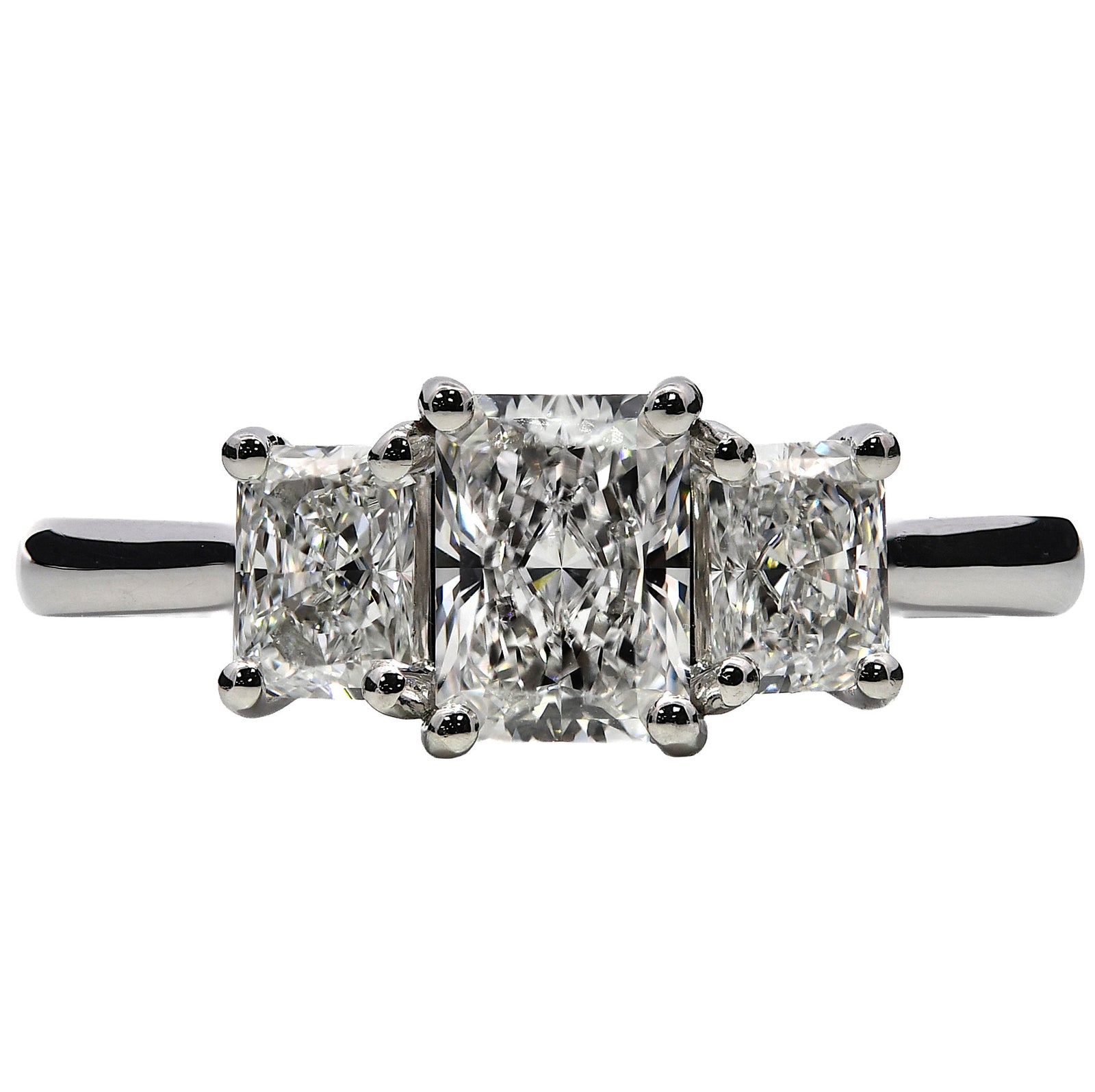 1.73ct natural diamond trilogy engagement ring, radiant cut, E colour, VVS1-VS1 clarity, GIA certified. Platinum