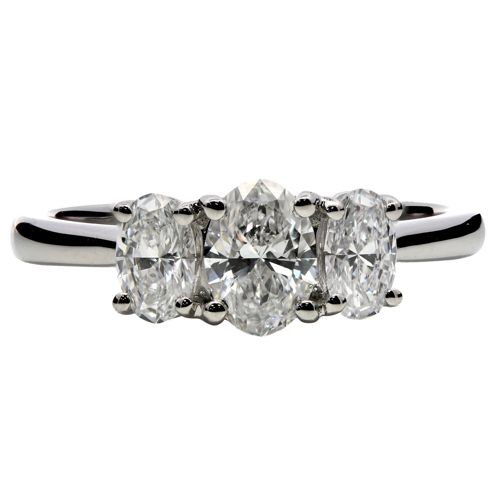 0.99ct natural diamond trilogy engagement ring, oval cut, D colour, VS1-2 clarity, GIA certified. Platinum