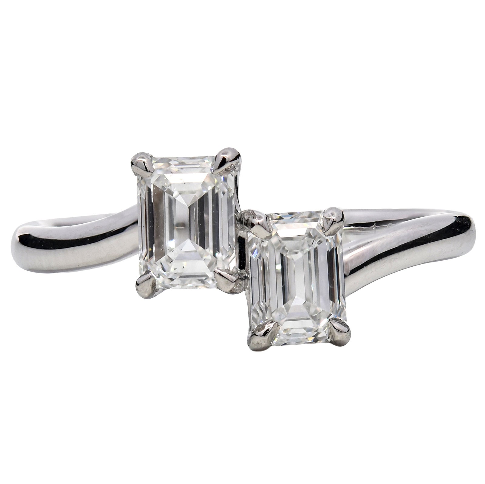 1.20ct natural diamond cross over engagement ring, emerald cut, D colour, SI2 clarity, GIA certified. Platinum