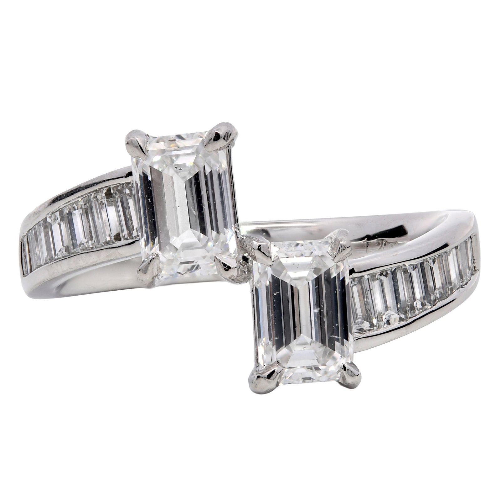 1.59ct natural diamond cross over engagement ring, emerald cut, D colour, SI1 clarity, GIA certified. Platinum
