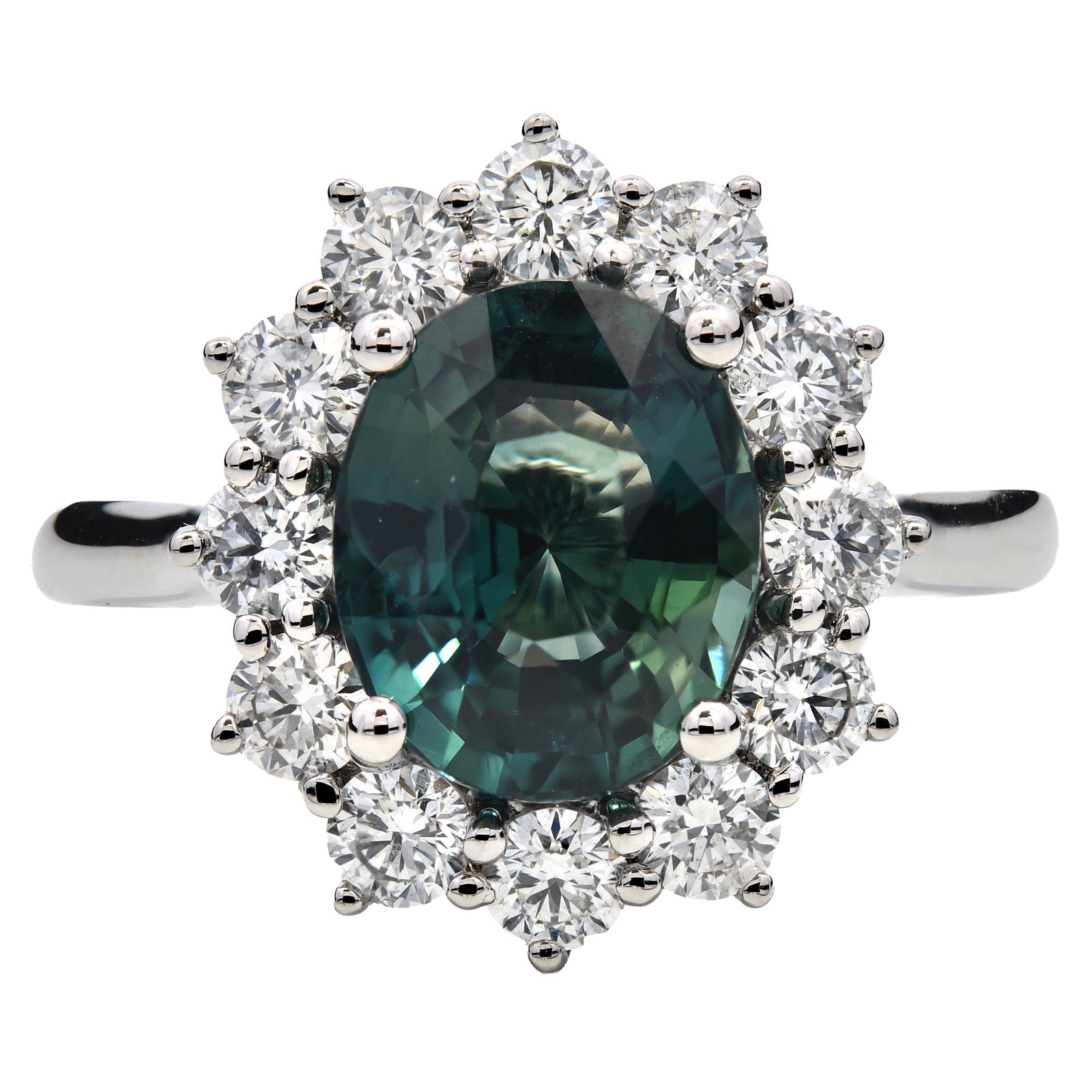 3.91ct teal sapphire & natural diamond engagement ring, oval cut set in a platinum halo. WGI certified