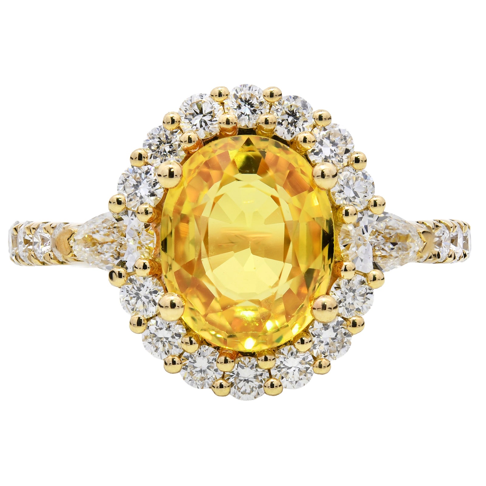 3.14ct yellow sapphire & natural diamond ring set in 18ct yellow gold. WGI certified