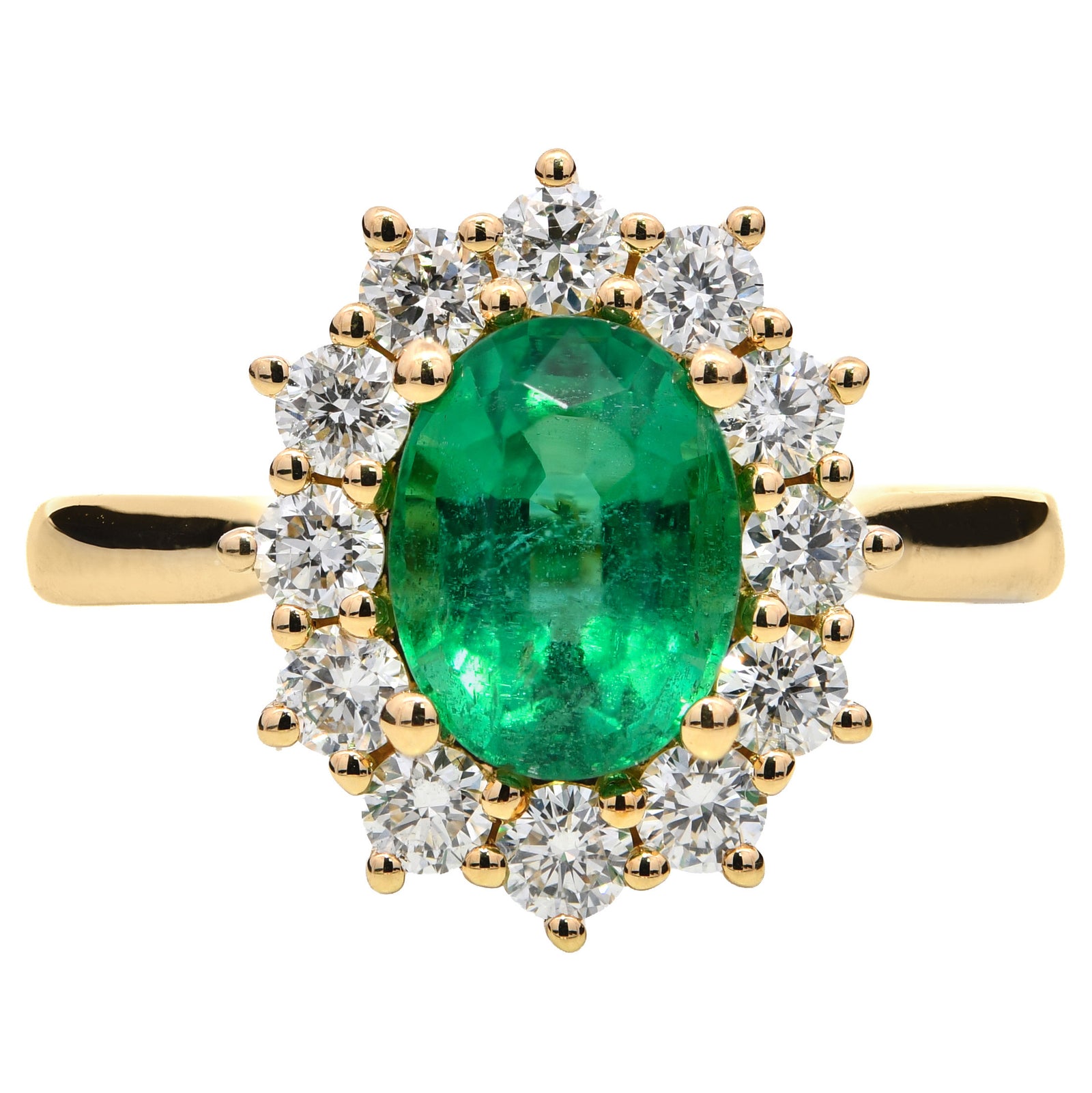 2.06ct emerald & natural diamond ring, oval cut set in an 18ct yellow gold halo, WGI certified