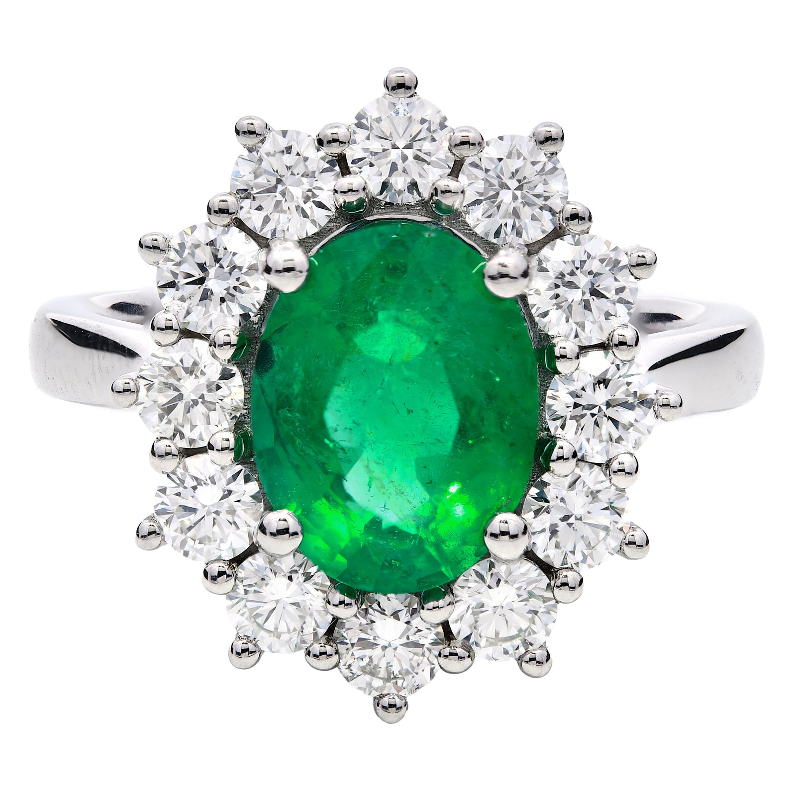 2.98ct emerald & natural diamond ring, oval cut set in a platinum halo, WGI certified