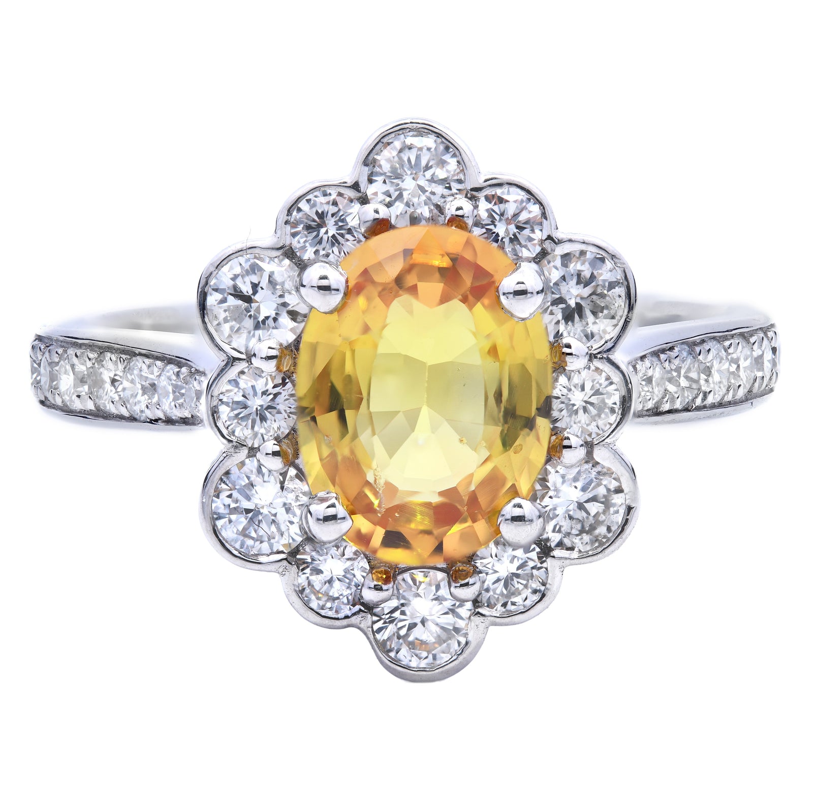 2.23ct yellow sapphire & diamond ring set in a platinum halo