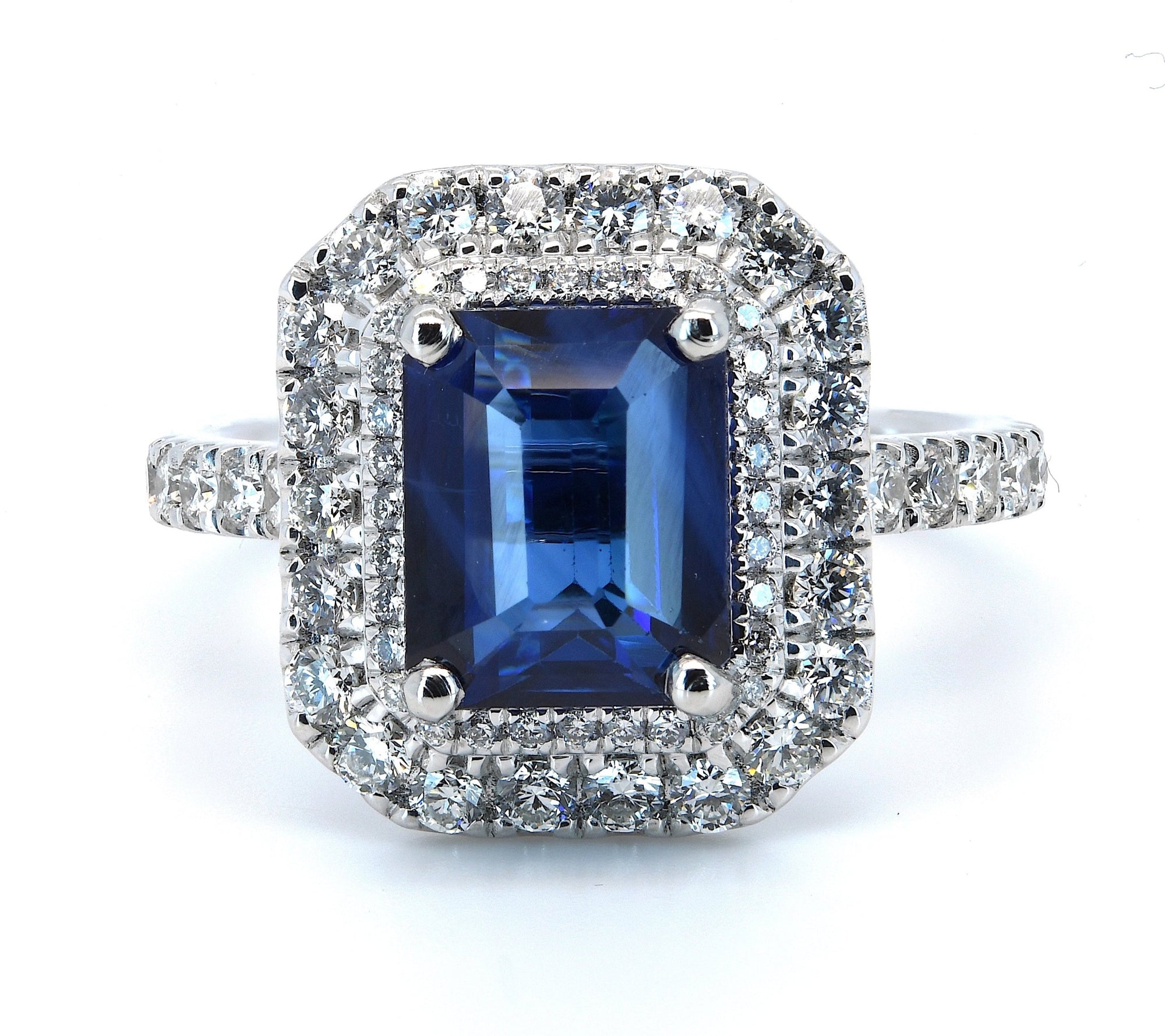 3.21ct sapphire & diamond ring set in a platinum double halo