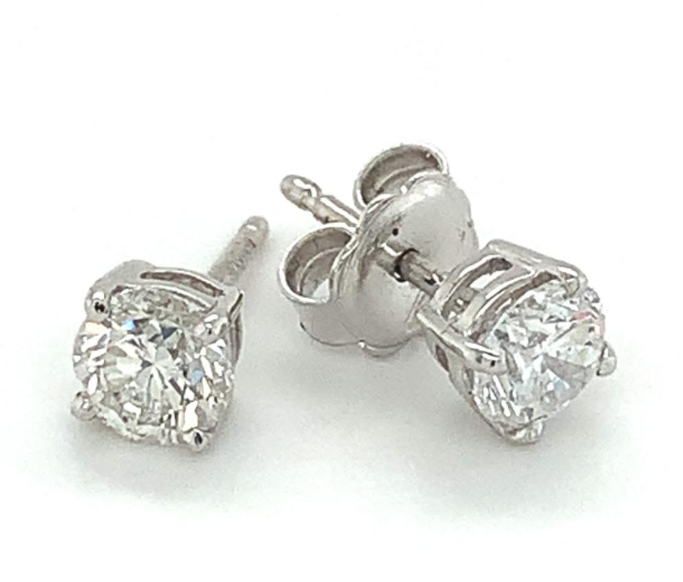 1.41ct round diamond stud earrings set in 18kt white gold, G/H colour, SI1-2 clarity
