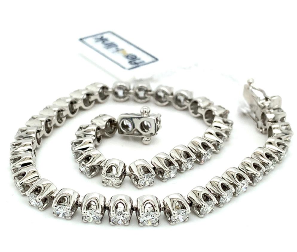 5.02ct round brilliant cut diamond tennis bracelet, 18kt white gold, G/H colour, SI clarity