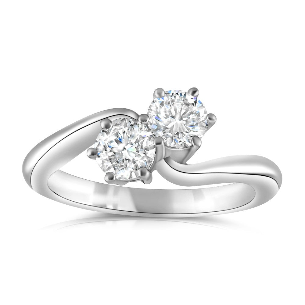 0.81ct round diamond cross over ring set in platinum