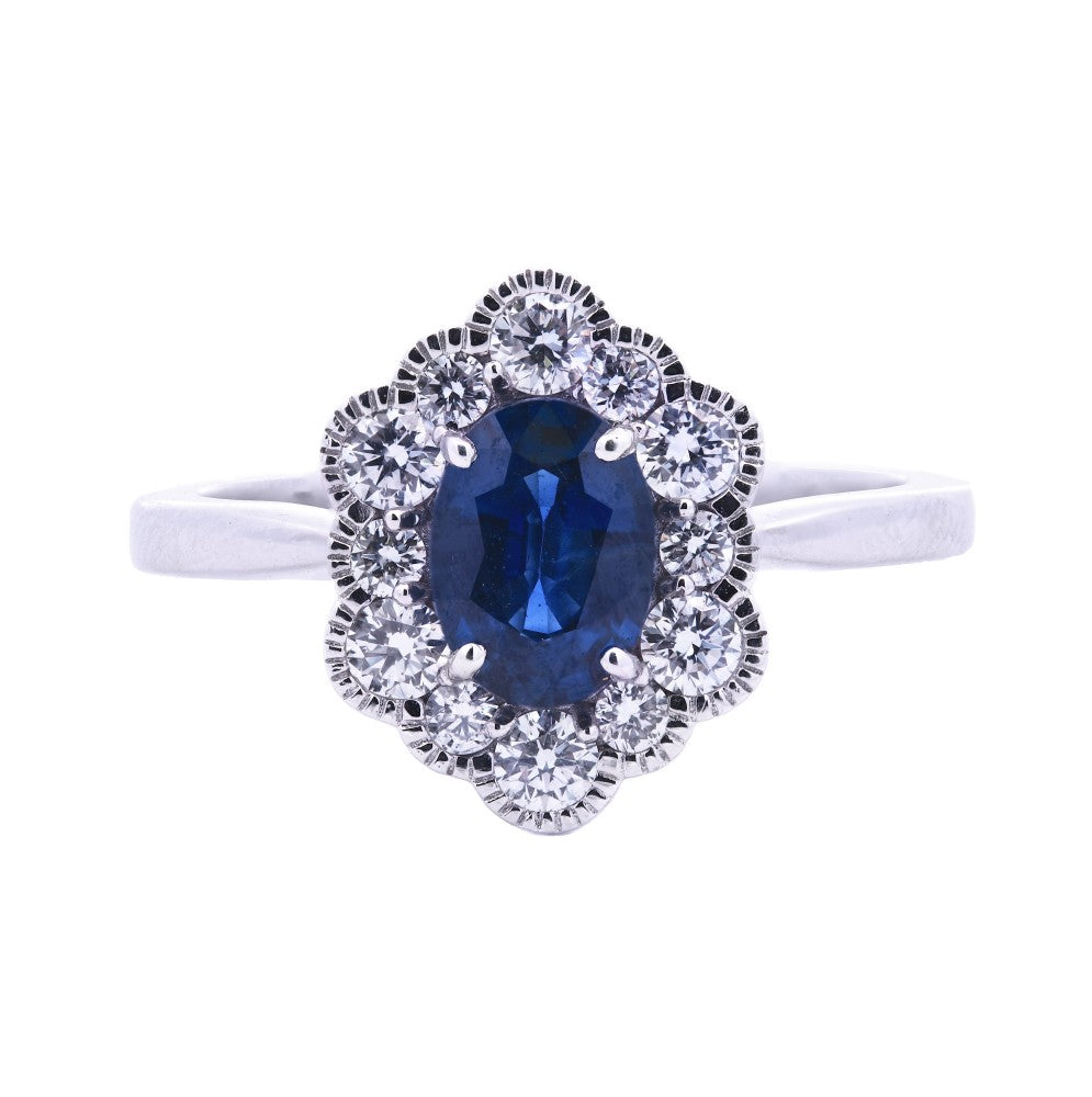 1.20ct sapphire & diamond engagement ring set in an 18ct white gold halo