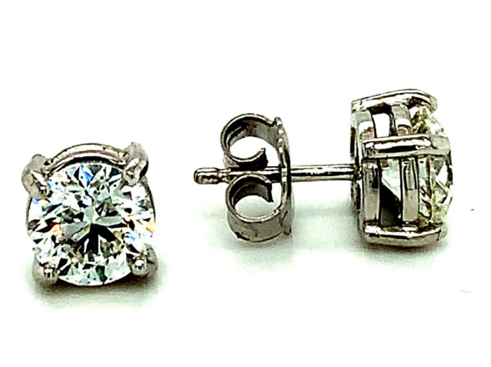 3.11ct round brilliant diamond stud earrings set in 18kt white gold, G/H colour, SI clarity