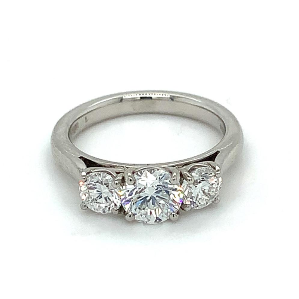 1.72ct premier round brilliant diamond trilogy engagement ring, platinum, E colour, SI1 clarity, IGI certified