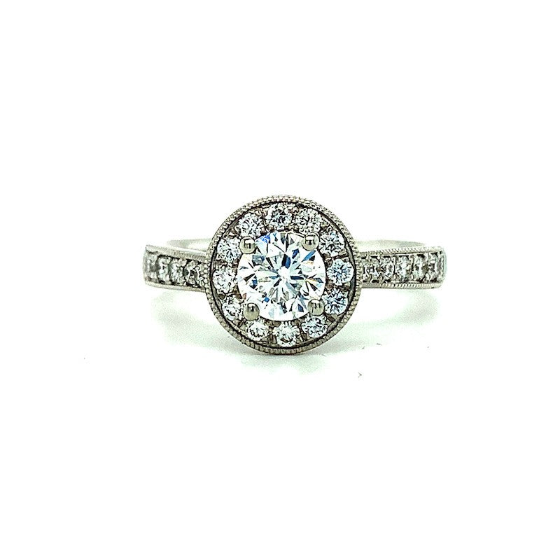 0.99ct round brilliant diamond engagement ring set in a platinum halo, G colour, SI1 clarity, IGI certified