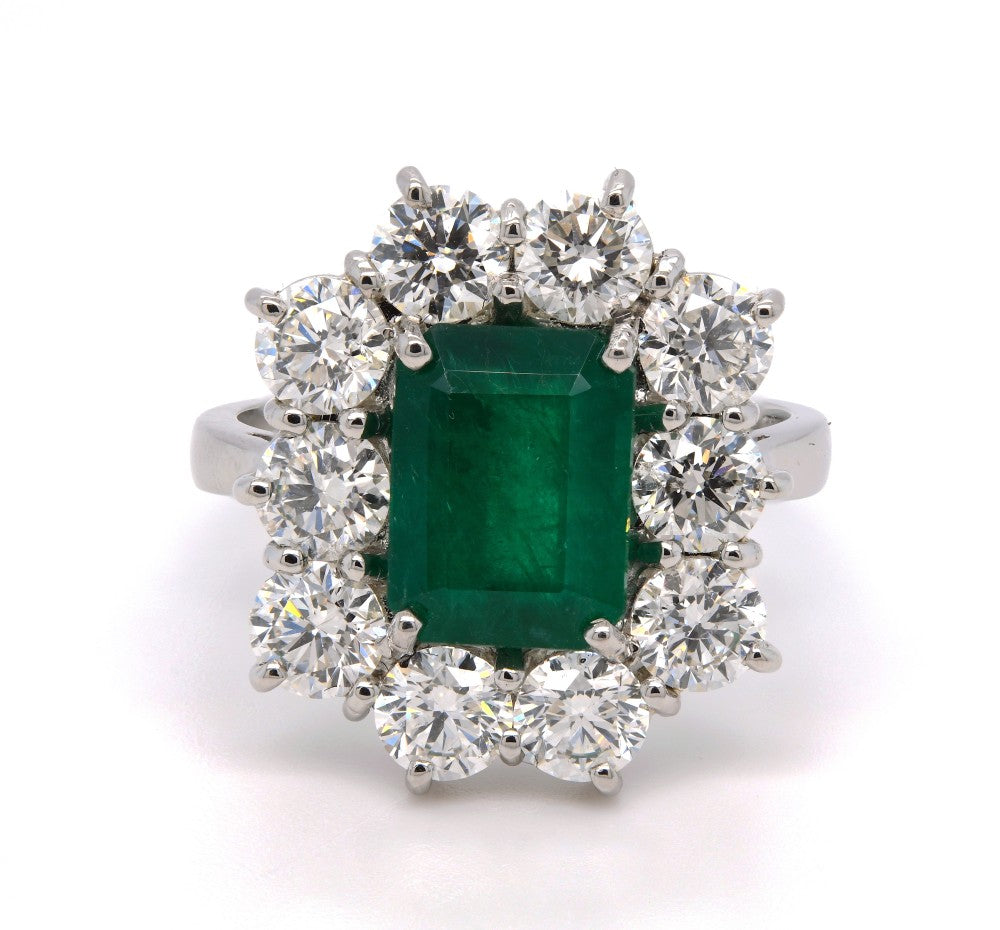 4.44ct emerald & diamond engagement ring set in a platinum halo