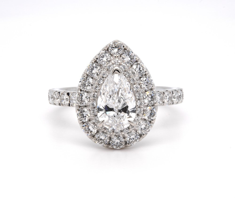 1.69ct pear shaped diamond engagement ring set in a platinum halo, D, SI2, GIA certified