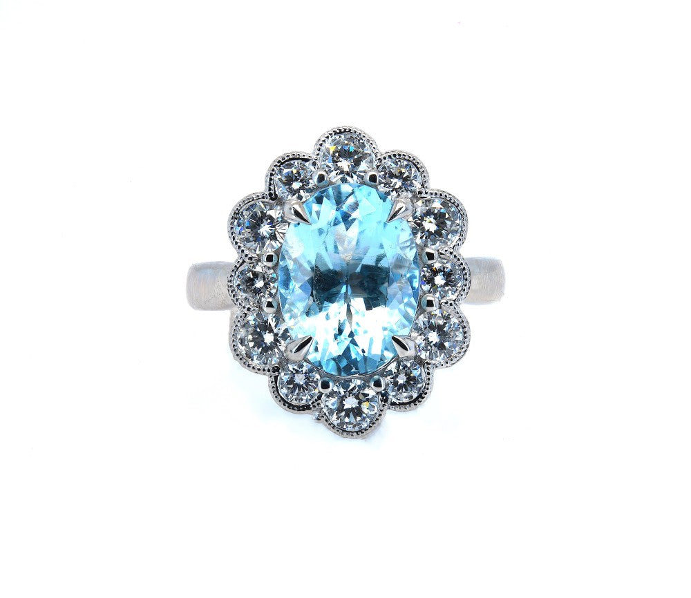 3.09ct aquamarine & diamond ring set in a platinum halo