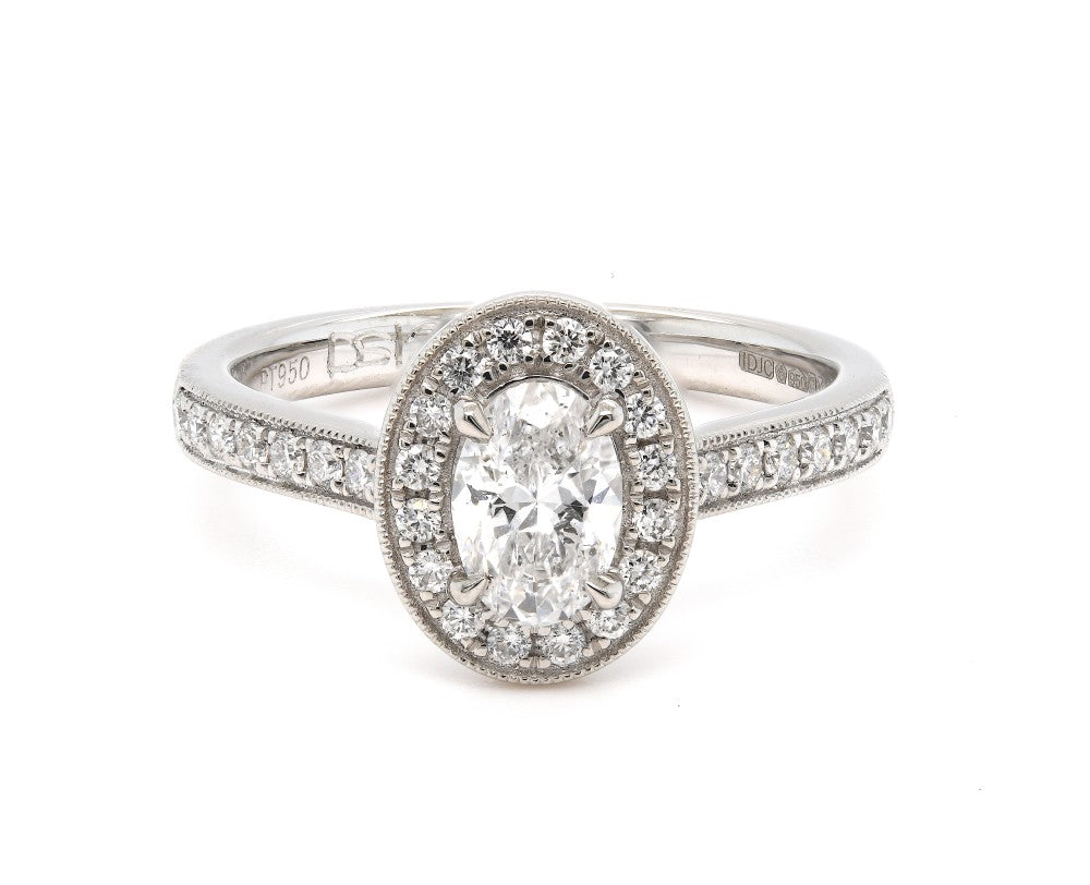 0.74ct oval cut diamond engagement ring set in a platinum halo, D, SI2, GIA certified