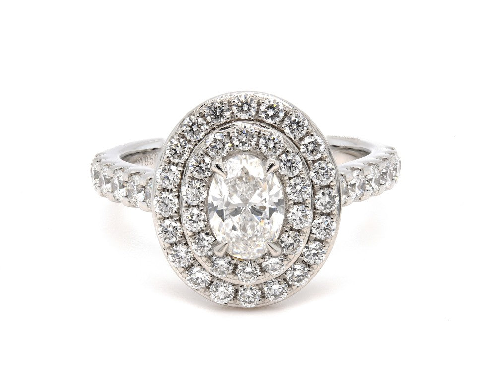 1.37ct oval cut diamond engagement ring set in a platinum double halo, E, SI1, GIA certified