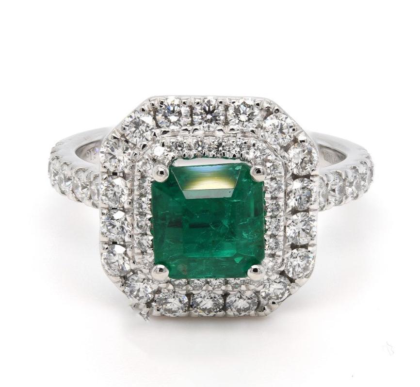 2.33ct emerald & diamond ring set in a platinum double halo