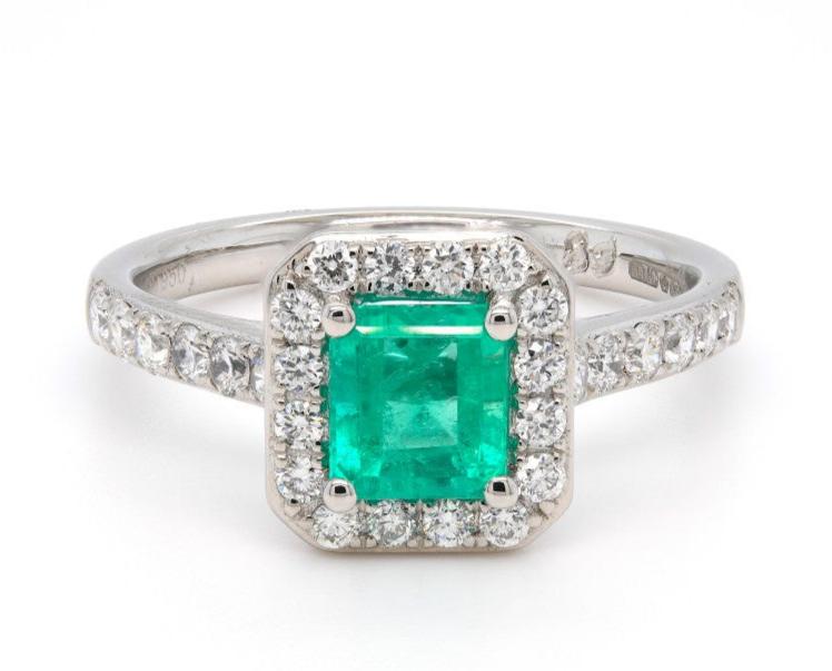 1.10ct emerald & diamond ring set in a platinum halo