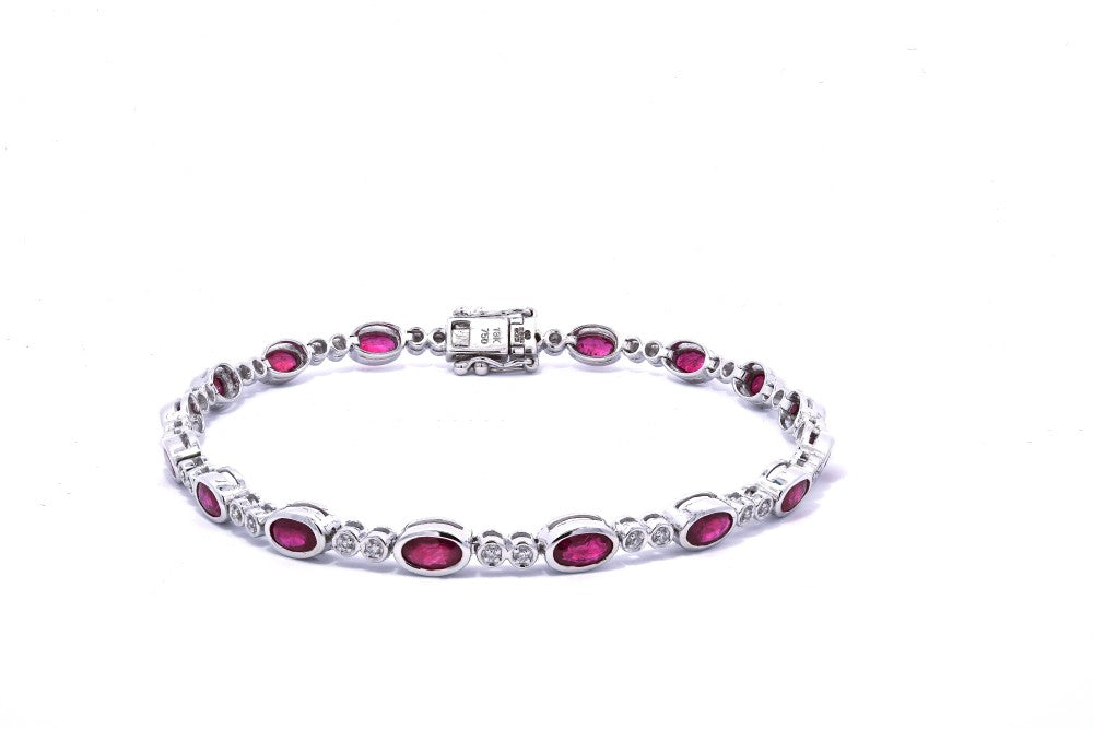 4.51ct ruby & diamond tennis bracelet set in 18ct white gold