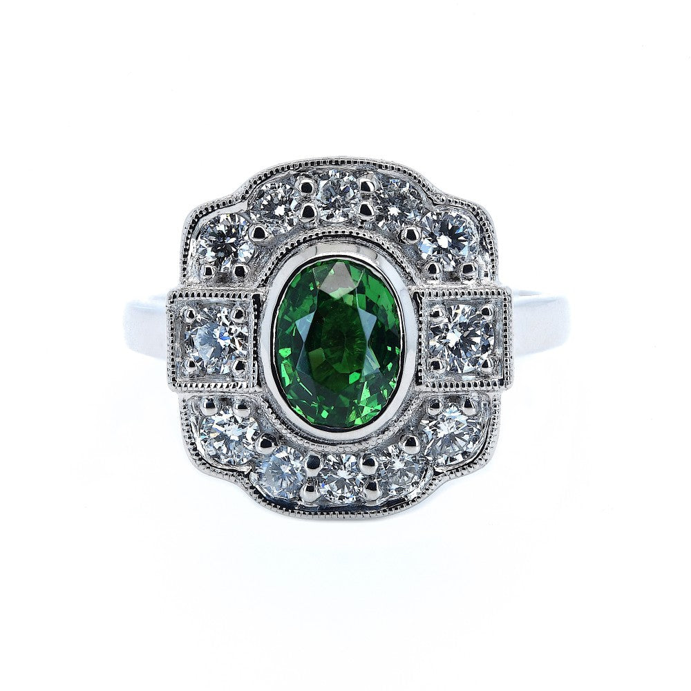 1.69ct oval cut tsavorite & diamond ring set in a platinum halo